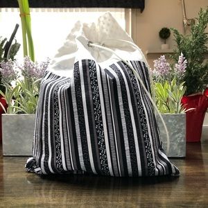 Black and white drawstring bag